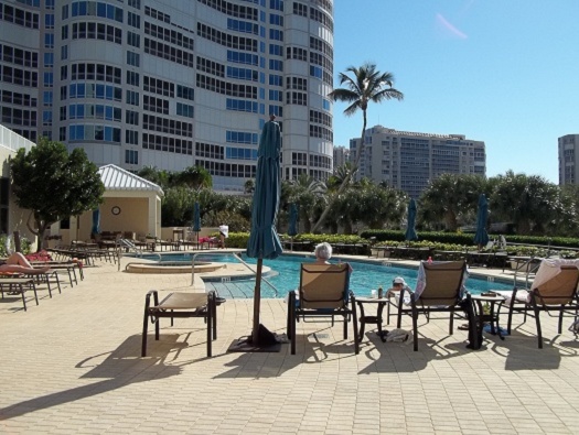 Swimming pool with lounge and bar area